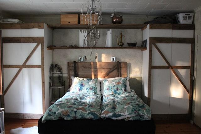 bedroom with bed and closets